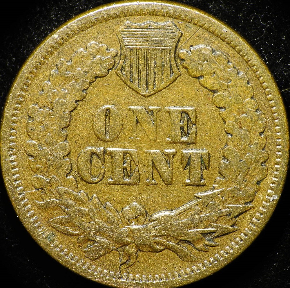 1868 Indian Head Penny die clash error showing ghost impressions of reverse wreath design in the obverse fields behind the Liberty portrait